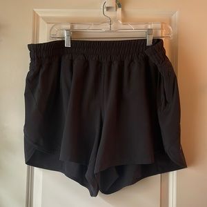 lululemon track that 5” black short